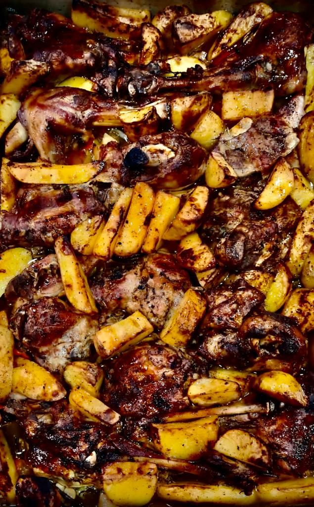 Rustidera de cordero al horno de leña